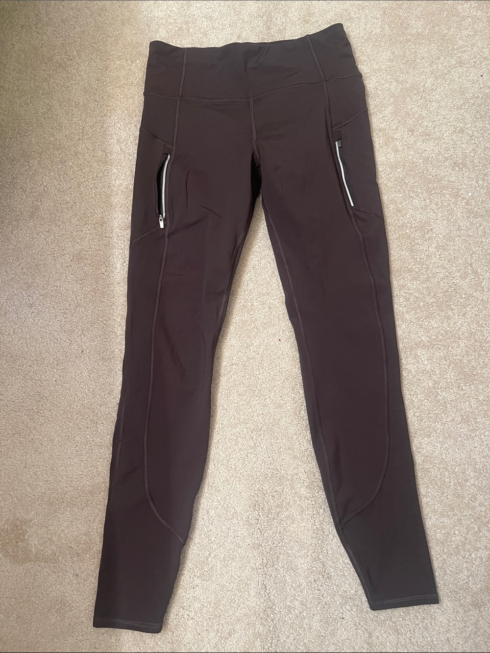 Athleta Black High-Rise Performance Leggings with Zip Pockets